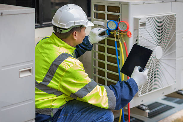 Professional Heat Pump Repair technician working in Akron, IN